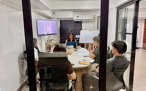 Arkive team reviewing a project together in the studio